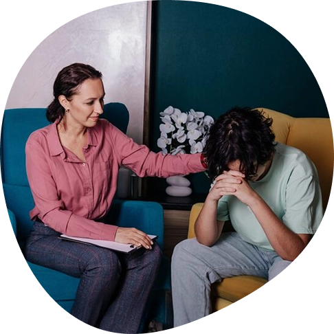Therapist discussing treatment goals with a patient during a psychiatry appointment