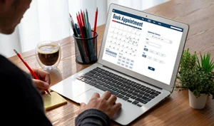 Laptop displaying a psychiatry appointment readiness checklist for new patients